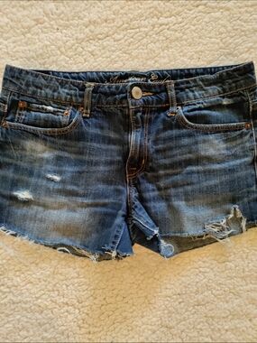 American Eagle Outfitters distressed medium blue denim cutoff shorts